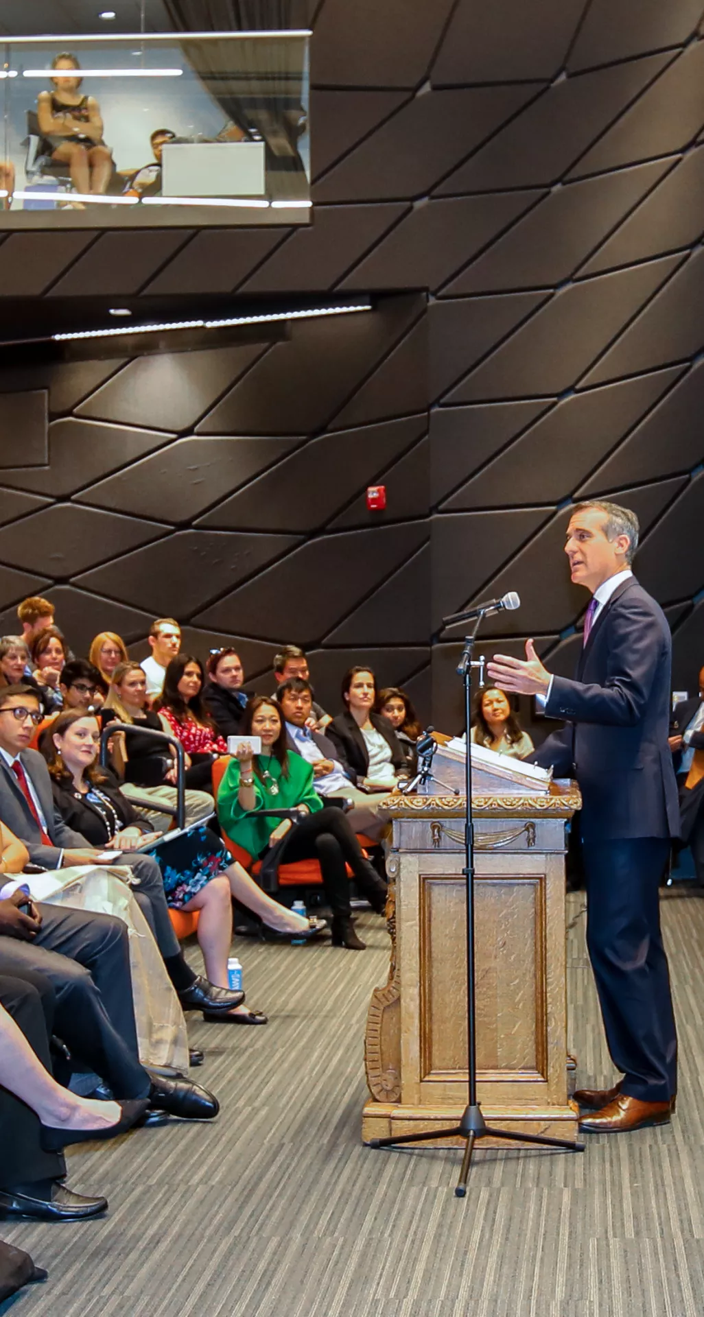 image shows Mayor Eric Garcetti at a podium speaking to an audience.